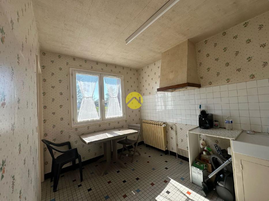 PAVILLON SUR SOUS-SOL  58M² 