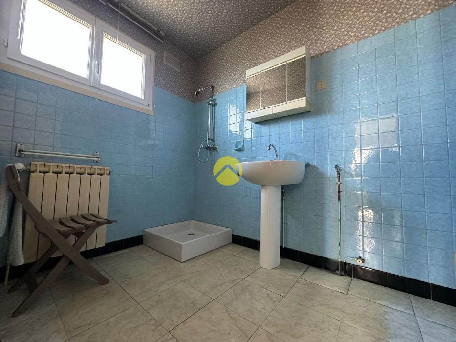 PAVILLON SUR SOUS-SOL  58M² 