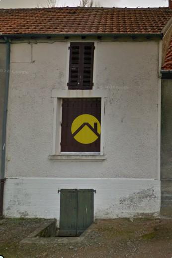 Maison mitoyenne avec jardin 