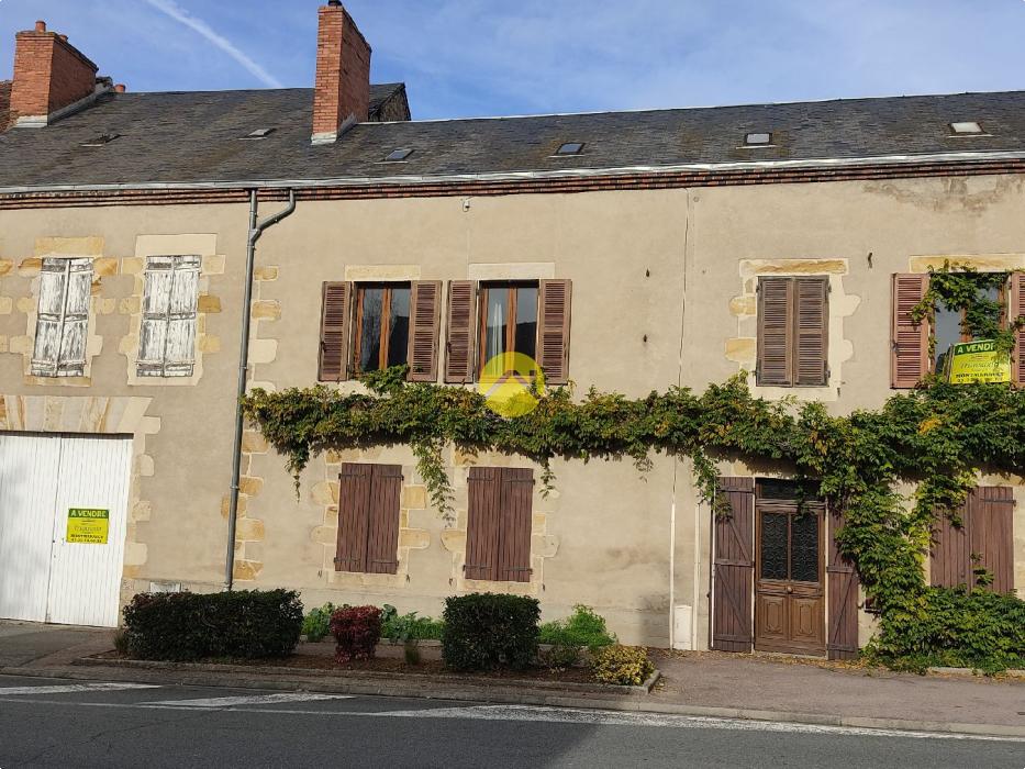 Maison avec garage et jardin