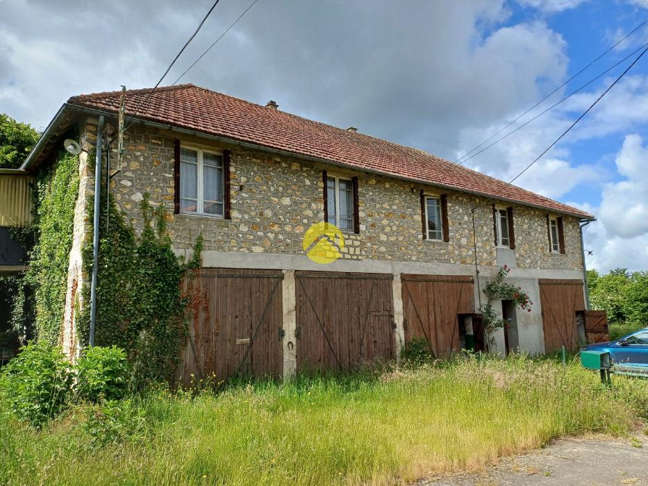 Maison mitoyenne à fort potentiel