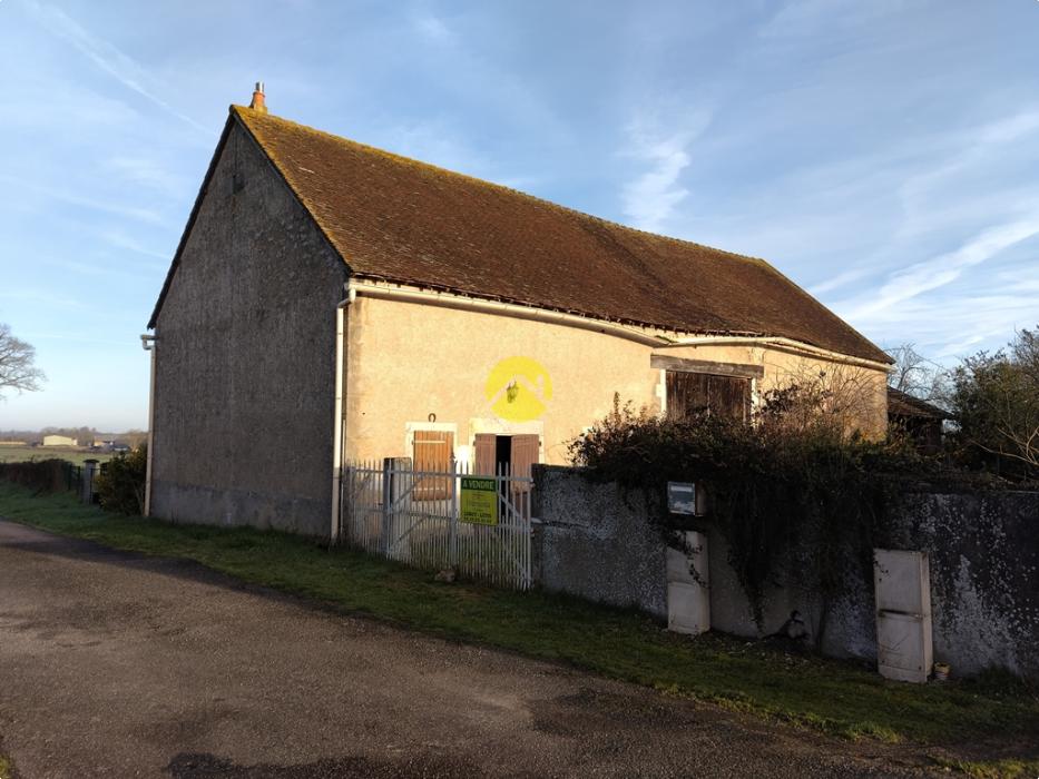 Corps de ferme proche village