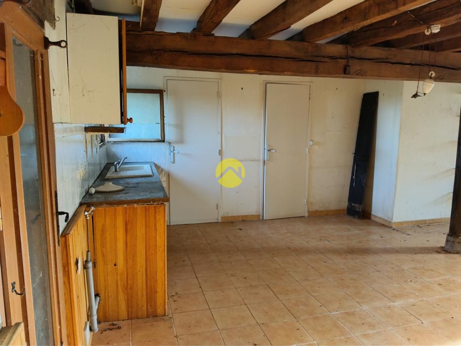 Corps de ferme proche village