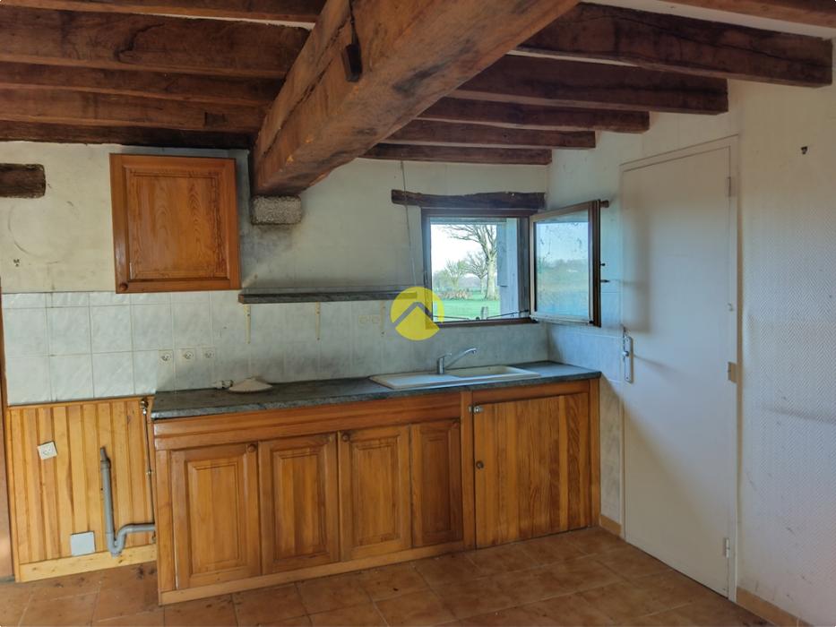 Corps de ferme proche village