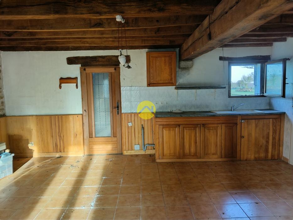 Corps de ferme proche village