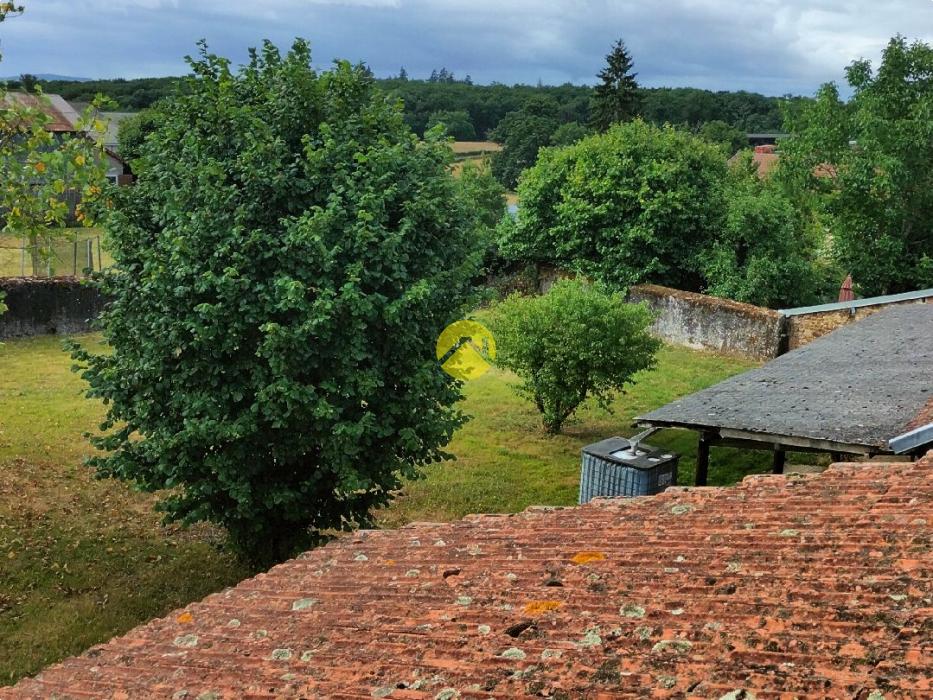 Maison avec grange et jardin