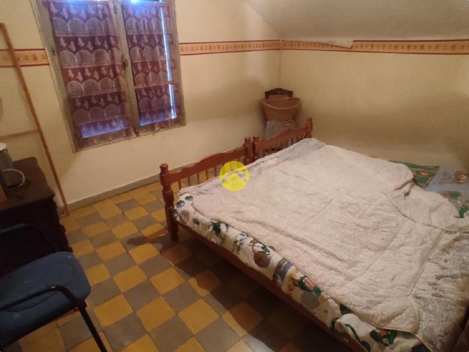 Maison mitoyenne sur étage