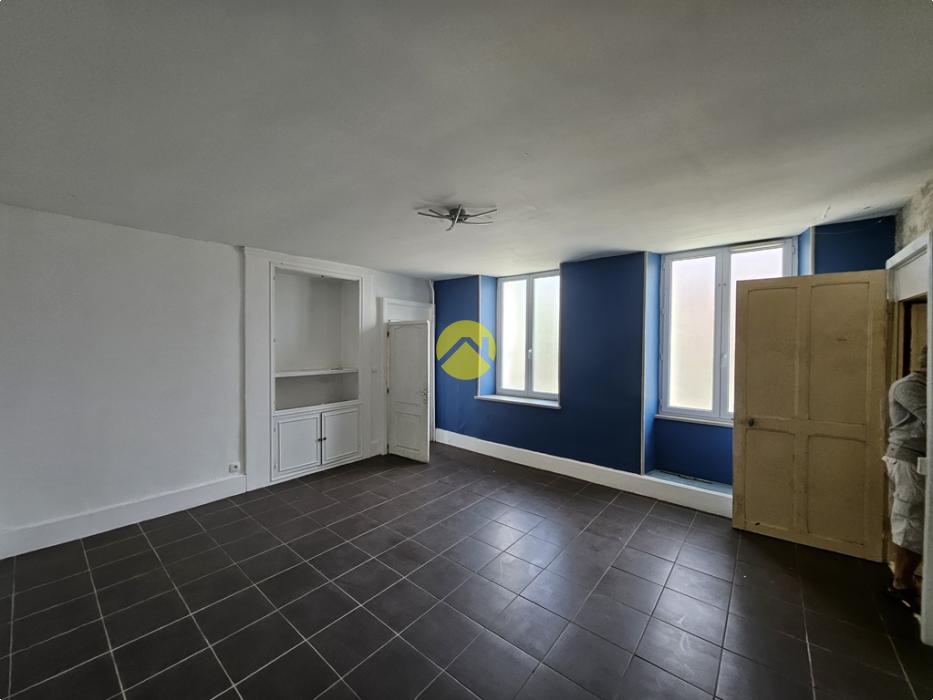 Maison de ville double potentiel