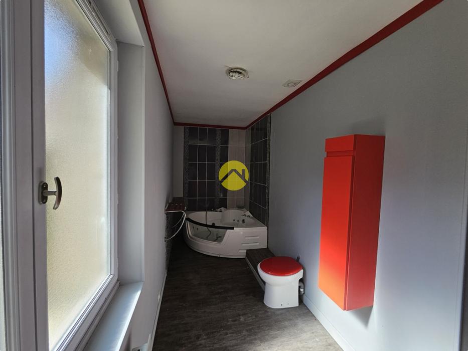 Maison de ville double potentiel