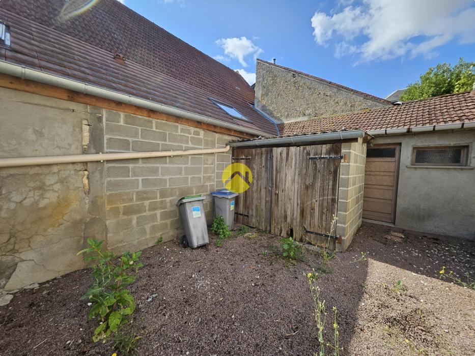 Maison de ville double potentiel