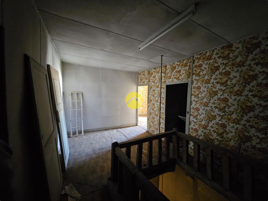 Maison de ville double potentiel