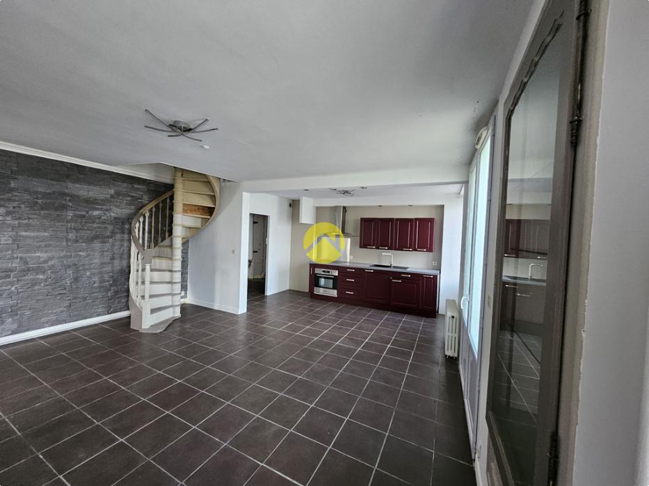 Maison de ville double potentiel