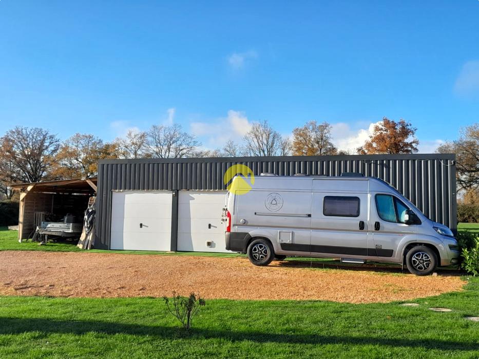 Maison+1 ha de terre+activité 