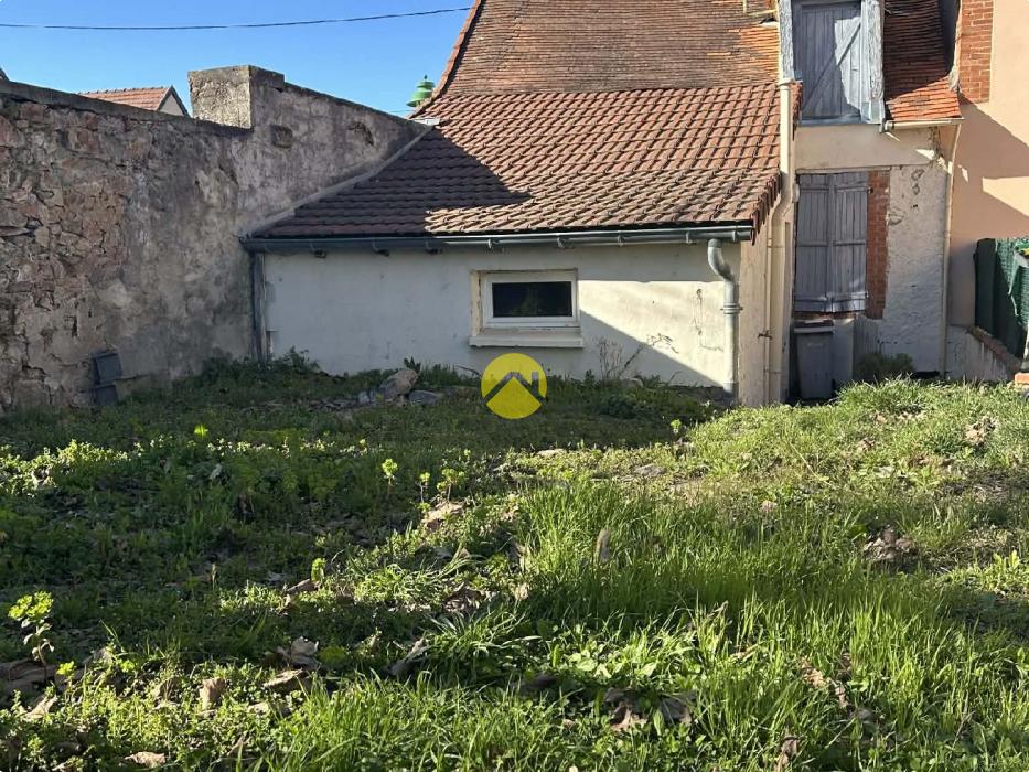 Maison mitoyenne d'un côté