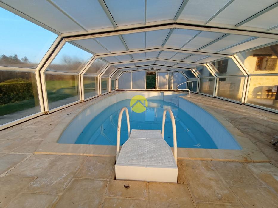 Belle maison avec un grand terrain 