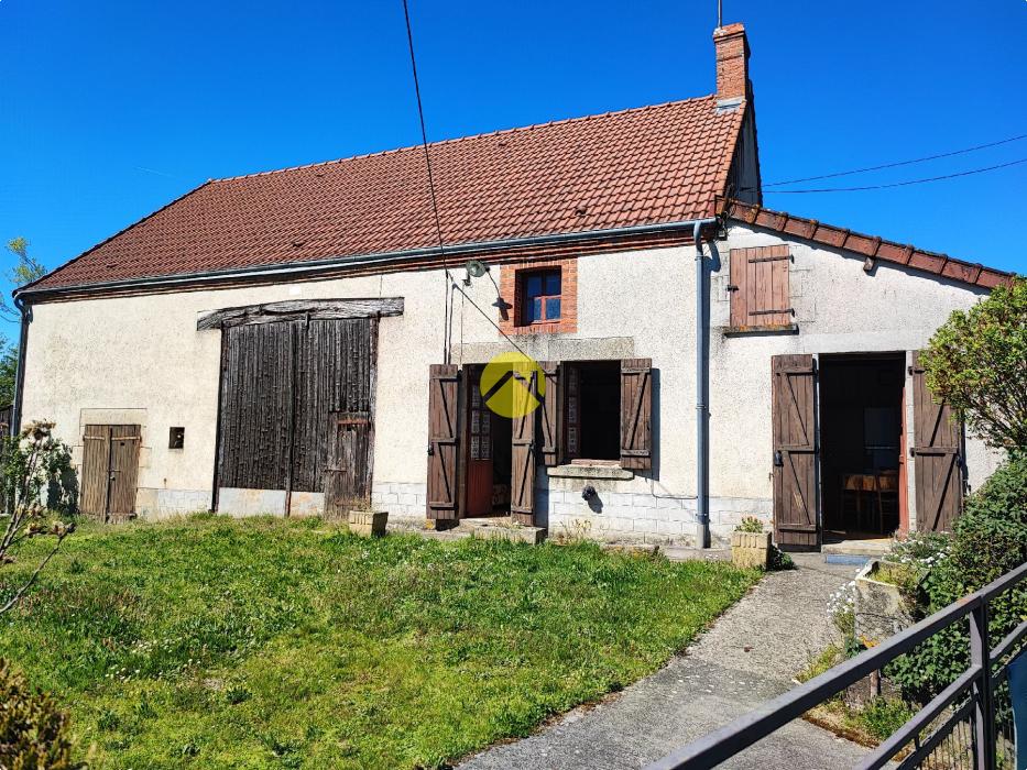 Maison de 55mm² avec un plan d'eau.