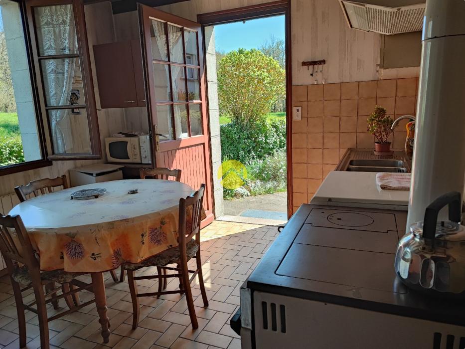 Maison de 55mm² avec un plan d'eau.