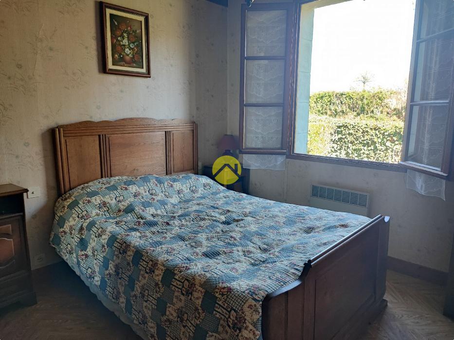 Maison de 55mm² avec un plan d'eau.