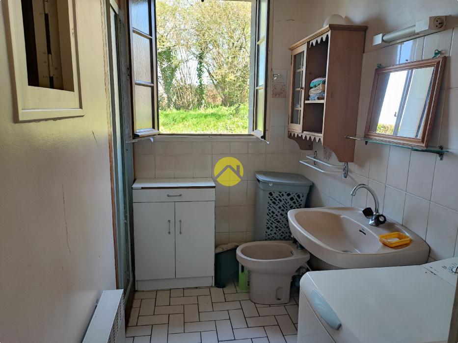 Maison de 55mm² avec un plan d'eau.