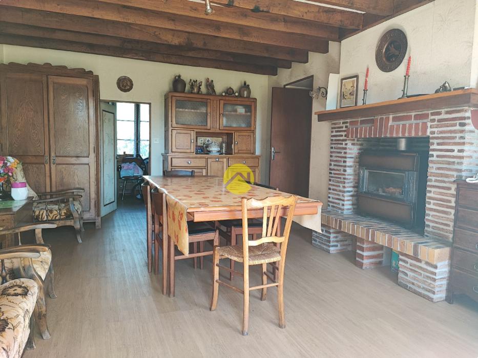 Maison de 55mm² avec un plan d'eau.