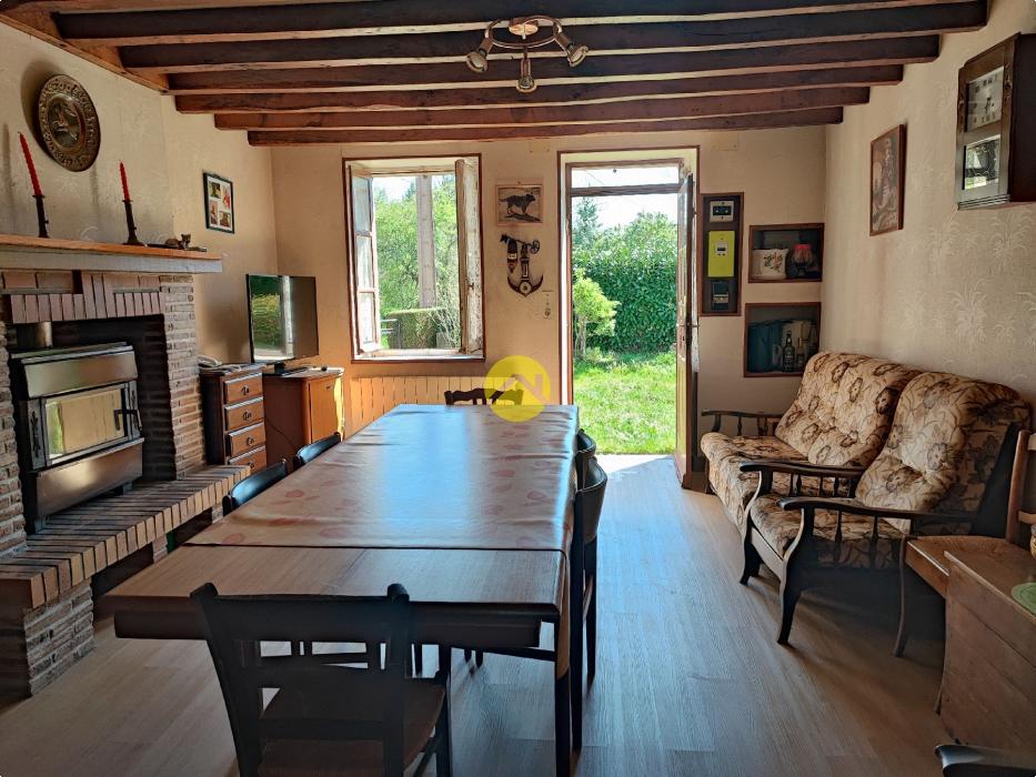 Maison de 55mm² avec un plan d'eau.