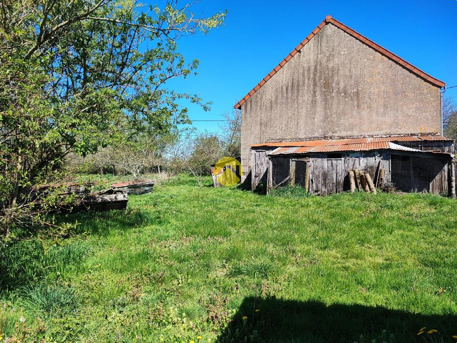 Maison de 55mm² avec un plan d'eau.