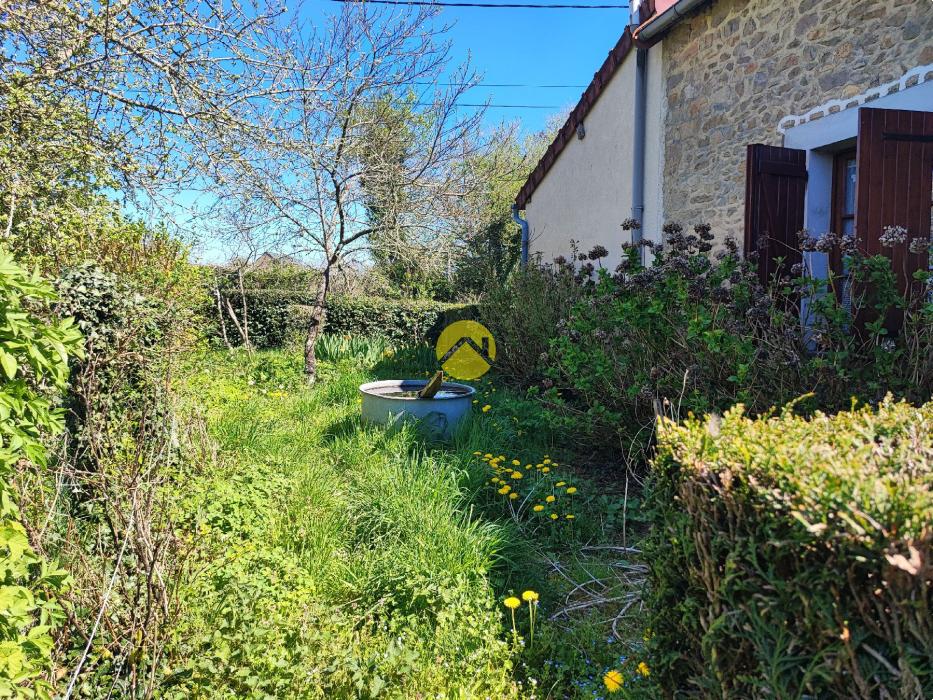Maison de 55mm² avec un plan d'eau.