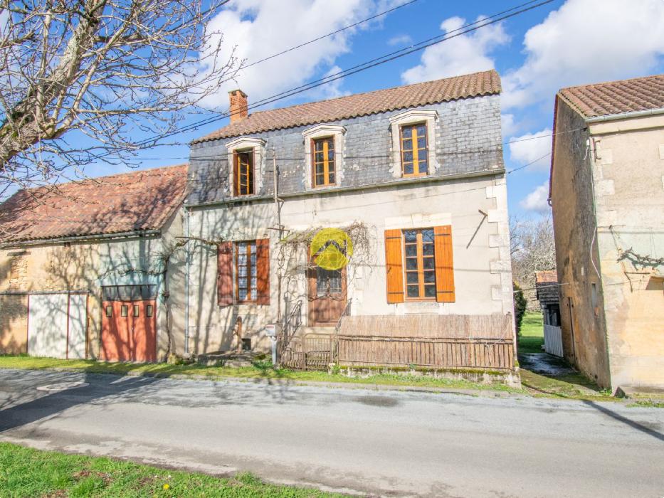Maison à rénover avec hangar