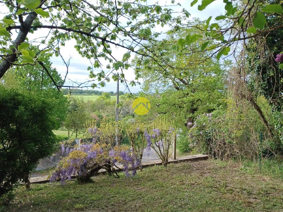 2 maisons avec garage et jardin