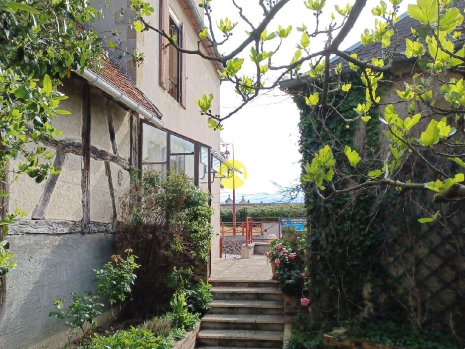 2 maisons avec garage et jardin