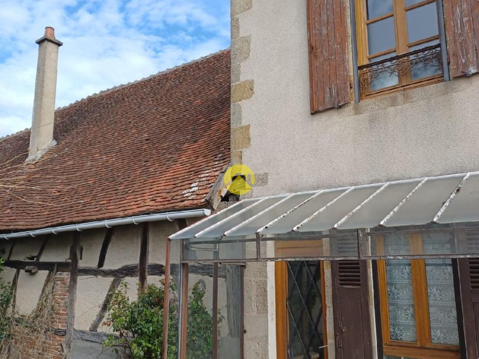 2 maisons avec garage et jardin