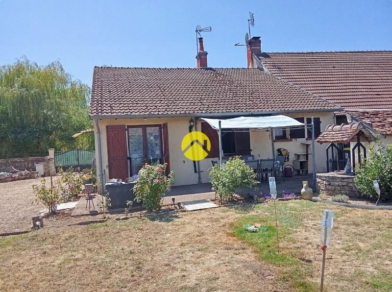Maison mitoyenne d'un côté
