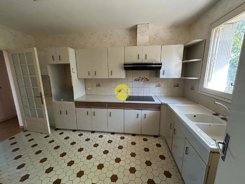 Maison sur sous sol + terrain 