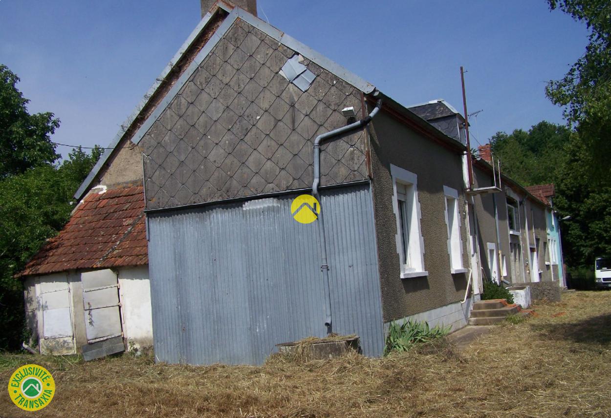 Propriété avec deux maisons